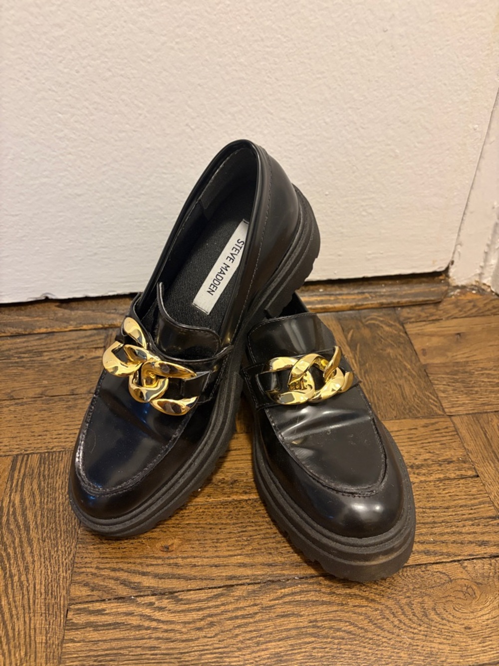 Steve Madden Black Leather Loafers with Gold Chain Accent